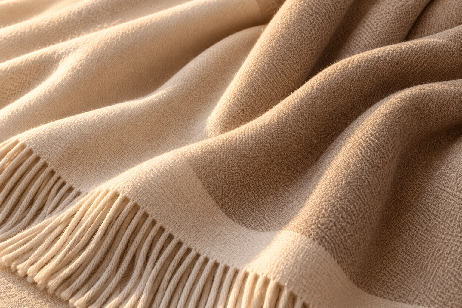 Fine ivory textile with a close, even weave and soft folds.